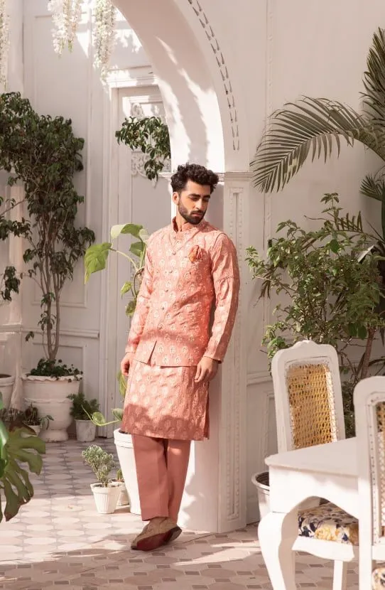 Salmon Pink Kurta Paired with Straight Pants and Embroidered Waistcoat