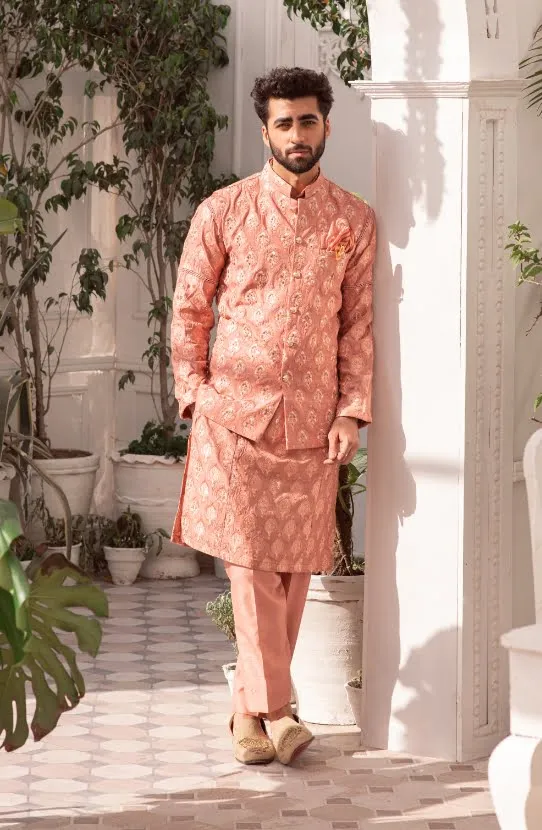 Salmon Pink Kurta Paired with Straight Pants and Embroidered Waistcoat